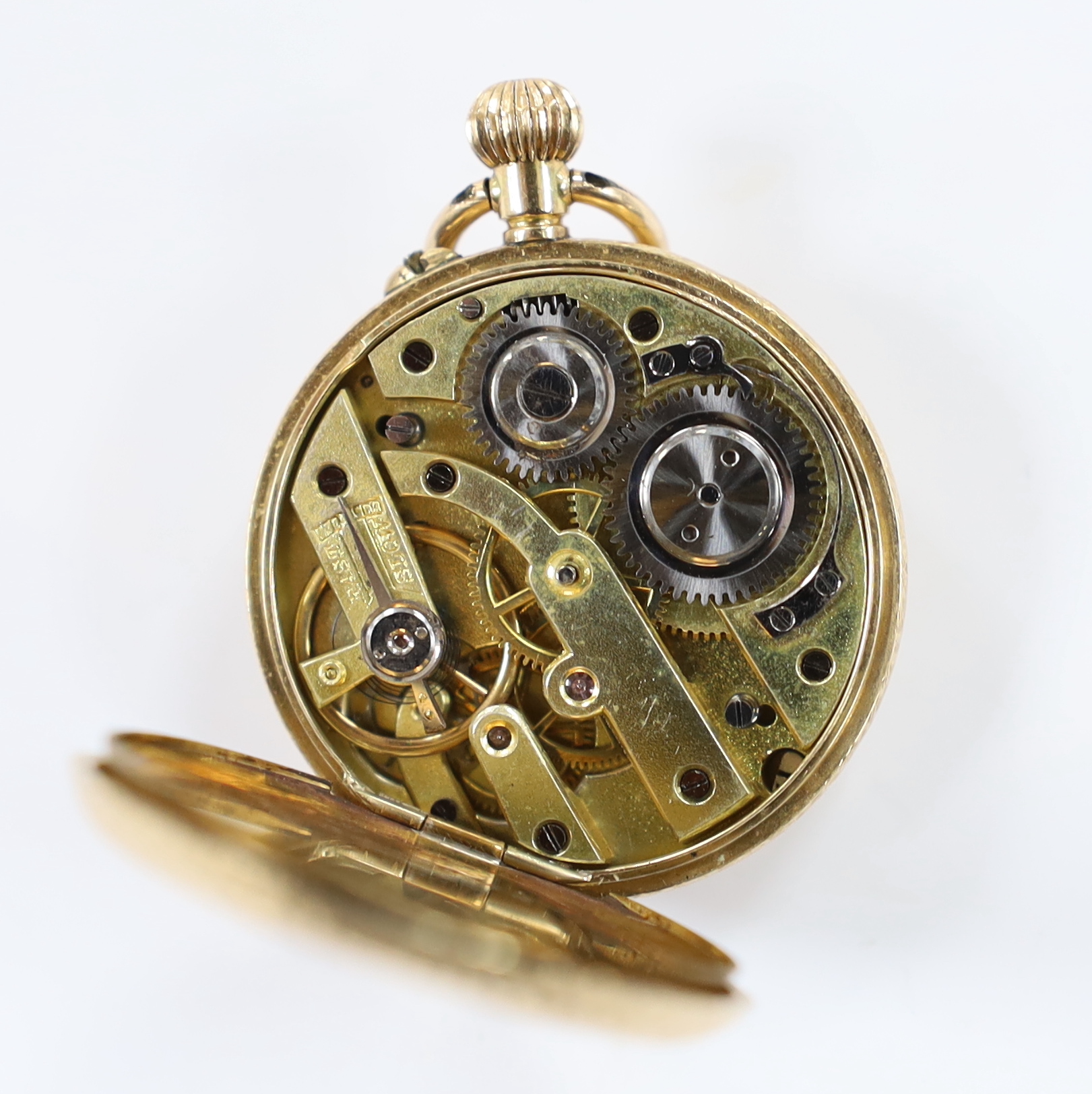 A lady's continental engraved 14k open face keyless fob watch, with Roman dial, gross weight 27.8 grams.